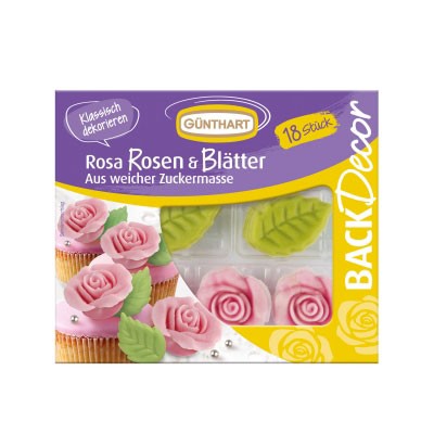 Rosa Zuckerrosen und Blätter